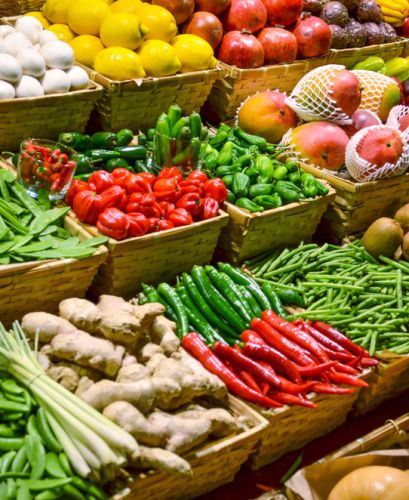 Fruits and veggies are assembled in bins
